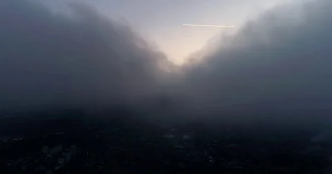 Aerial view of sky over the clouds in the sunset. Top view. Stock Footage 84048870