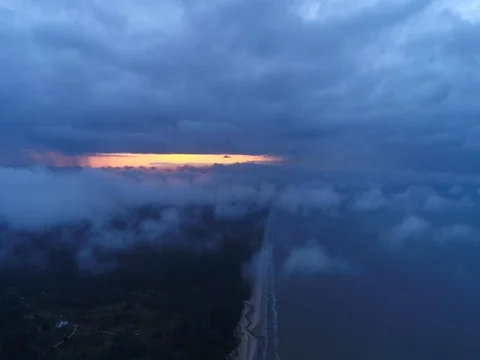 Aerial view of sky over the clouds in the sunset. Top view. Stock Footage 84296668