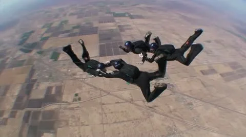 Aerial View Of Skydivers Doing Formations 4 Stockbeeldmateriaal 19157178