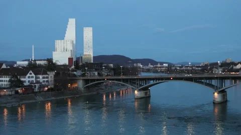 Aerial view of the skyline of Basel at dusk with River Rhine Stock Footage 239430232