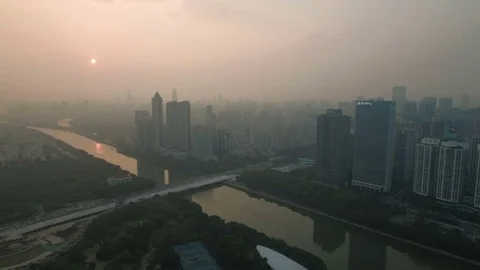 Aerial view of skyline Guangzhou, China at sunset Stock Footage