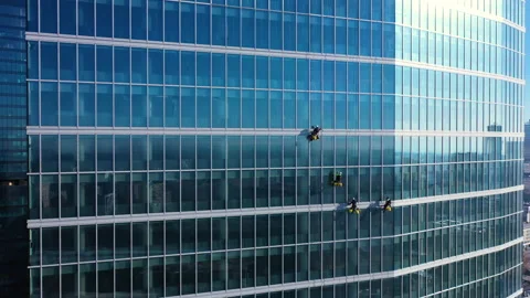 Aerial view of skyscraper and window cleaners in Warsaw city center 스톡 동영상 136484140