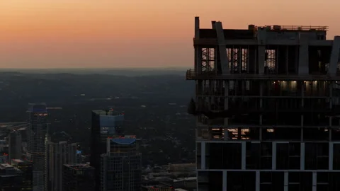 Aerial View of a Skyscraper Under Construction at Dusk in Austin Texas Stock Footage 336794218