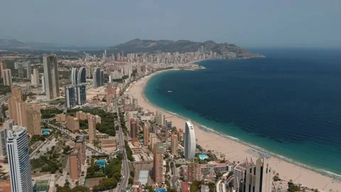 Aerial view of skyscrapers of Benidorm, Spain, Intempo Building, long sand beach Stock Footage 300180553