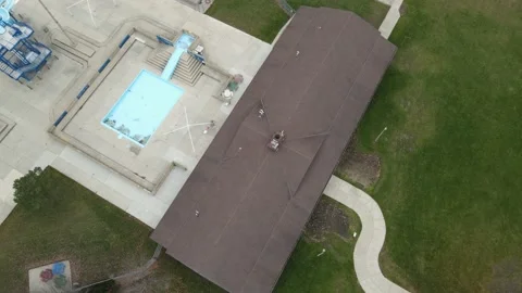 Aerial view of slide in pool at Anderson Park in Kenosha, WIsconsin. Stock Footage 165914922