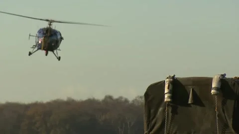 Aerial View of Sling Load Operations - CH-47 Chinook and Eurocopter AS532 Co Stock Footage 166450606