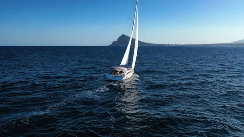 Aerial view of sloop sailing. Stock Footage 136805416