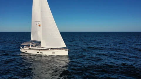 Aerial view of sloop sailing. 動画素材 136808254