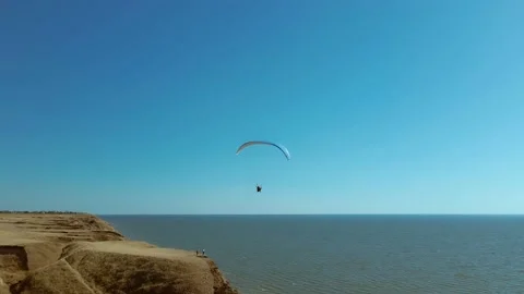 Aerial view slow motion filming of active leisure with paragliding, active Stock-Footage 211135764