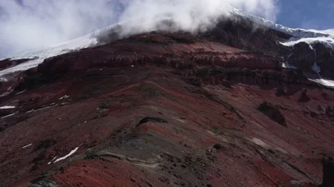 Aerial view that slowly flows over the edge of the mountain or vulcano Stock Footage 142748837