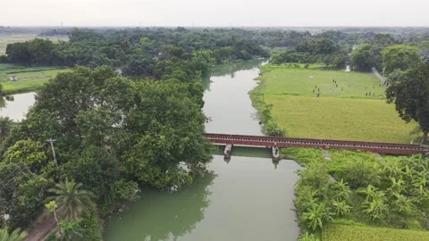 Aerial View of Small Bridge Over Canal in Rural Countryside Stock Footage 334602851