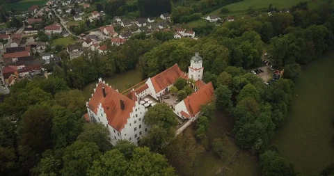 Aerial view of small castle in Bavaria in Germany on a sunny day Video stock 117368341