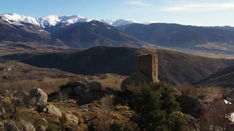 Aerial view of a small castle surrounded by french mountains. Stock Footage 172072812