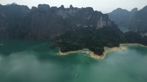 Aerial view of a small dock on a lake Stock Footage 266493239