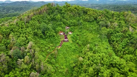 Aerial View of Small Eco Glamping Hidden on Hilltop Stock Footage 336486393
