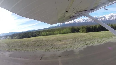 Aerial view small engine airplane gaining height Stock Footage 81909941