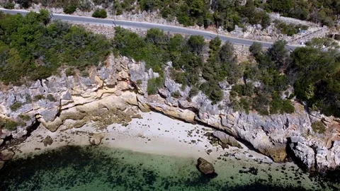 Aerial View of a Small Hidden Beach Video stock 237637578