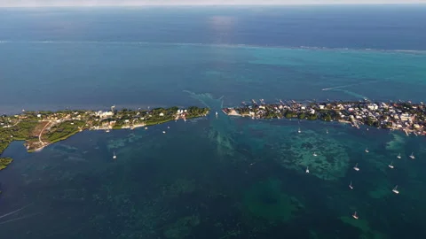 Aerial view of small island strait in the shallow caribbean sea Stock-Footage 342731911