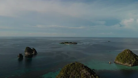 Aerial View of Small Islands Surrounded by Flat Water Stock Footage 121735108