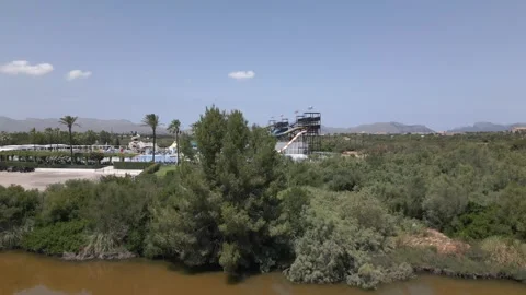 Aerial View of Small Lagoon and Coastal Town, Maristany, Mallorca, Spain Stock Footage 340589548