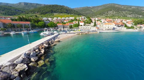 Aerial view of small lighthouse in Bol harbour on the island of brac, Croatia. Stock Footage 51044342