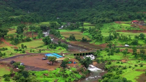 Aerial View of a Small Open Bridge Crossing a Flowing River in Maharashtra Stock Footage 342701821