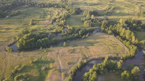 Aerial view on the small plain river with meanders in Russia 動画素材 93605222