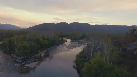 Aerial view of small river among hills on autumn Stock Footage 78593209