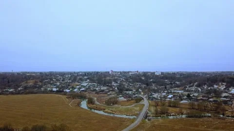 Aerial view of a small town covered in snow on a cold winter day. Stock Footage 159288547