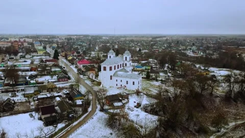 Aerial view of a small town covered in snow on a cold winter day. Stock Footage 159474183