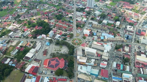 Aerial view of a small town with dense residential and commercial buildings. Stock Footage 311269964