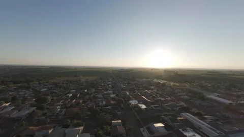 Aerial View of Small Town at Dusk – Warm and Peaceful Atmosphere Stock Footage 306499666