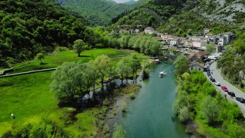 Aerial view on small town in mountain valley 스톡 동영상 188743540