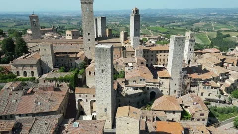 Aerial view of small town in the ountryside in tuscany Stock Footage 248221066