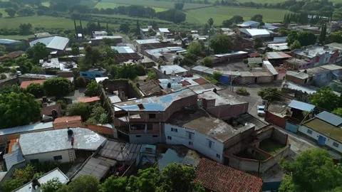Aerial view of small town rooftops with a church dome Stock Footage 342061754