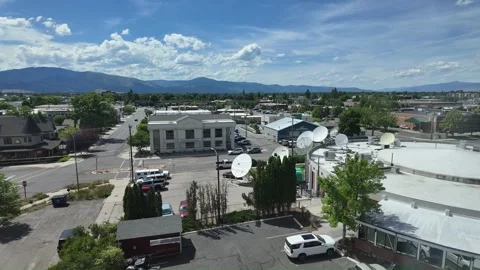 Aerial view of small town with scattered buildings and trees.Time Lapse 库存影片 340430550