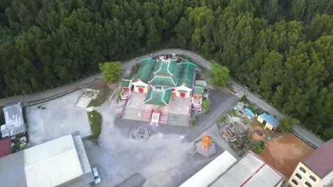 Aerial view of small town, temple and mangrove in Kuala Sepetang Stock Footage 152565990