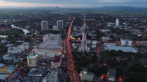 Aerial View of small town view traffic at twilight_zoom-out Stock Footage 77198338