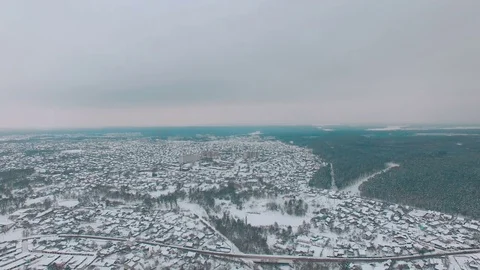 Aerial view on small town at winter near forest 库存影片 71355293