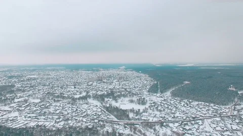 Aerial view on small town at winter near forest Stock Footage 71356064