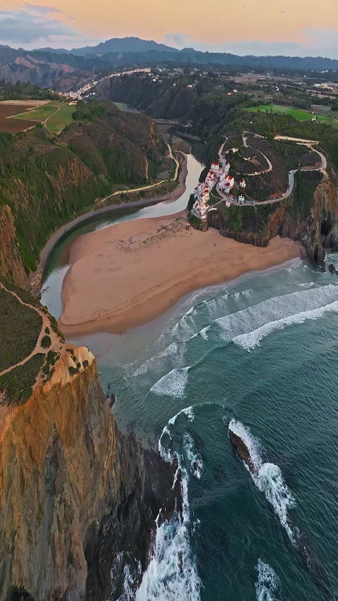 Aerial view of small village with windmill and picturesque rooftops, Odeceixe 스톡 동영상 319968709