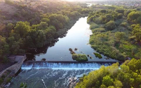 Aerial view on the small waterfall Stock Photos