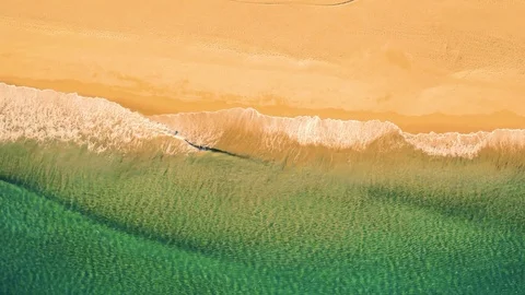 Aerial View Small Waves on Sandy Beach Stock Footage 72309960