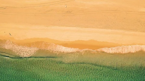 Aerial View Small Waves on Sandy Beach Stock Footage 72310059