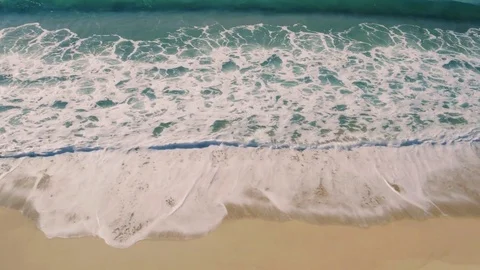 Aerial View Small Waves on Sandy Beach Stockbeeldmateriaal 72523922