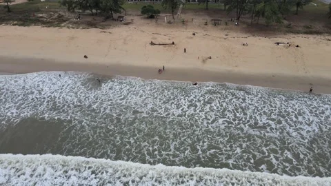 Aerial view of Small Waves Splashing on the Beach in Malaysia Stock Footage 147568474