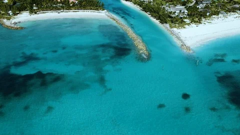 Aerial View of Smith Point Beachfront and Tropical Shoreline, Grand Bahama Stock Footage 98964594