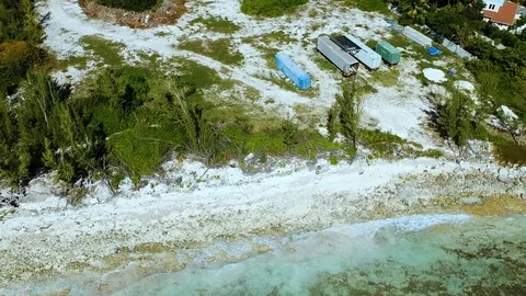 Aerial View of Smith Point Beachfront and Tropical Shoreline, Grand Bahama Stock Footage 98964886