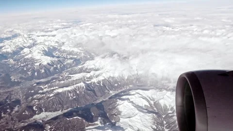 Aerial view of the snow capped Alps, rugged mountain peaks landscape. Stock Footage 313007708