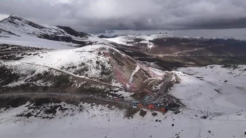 Aerial view of snow-capped mountain road at Sejila Mountain Pass G318 Tibet Stock Footage 306864980